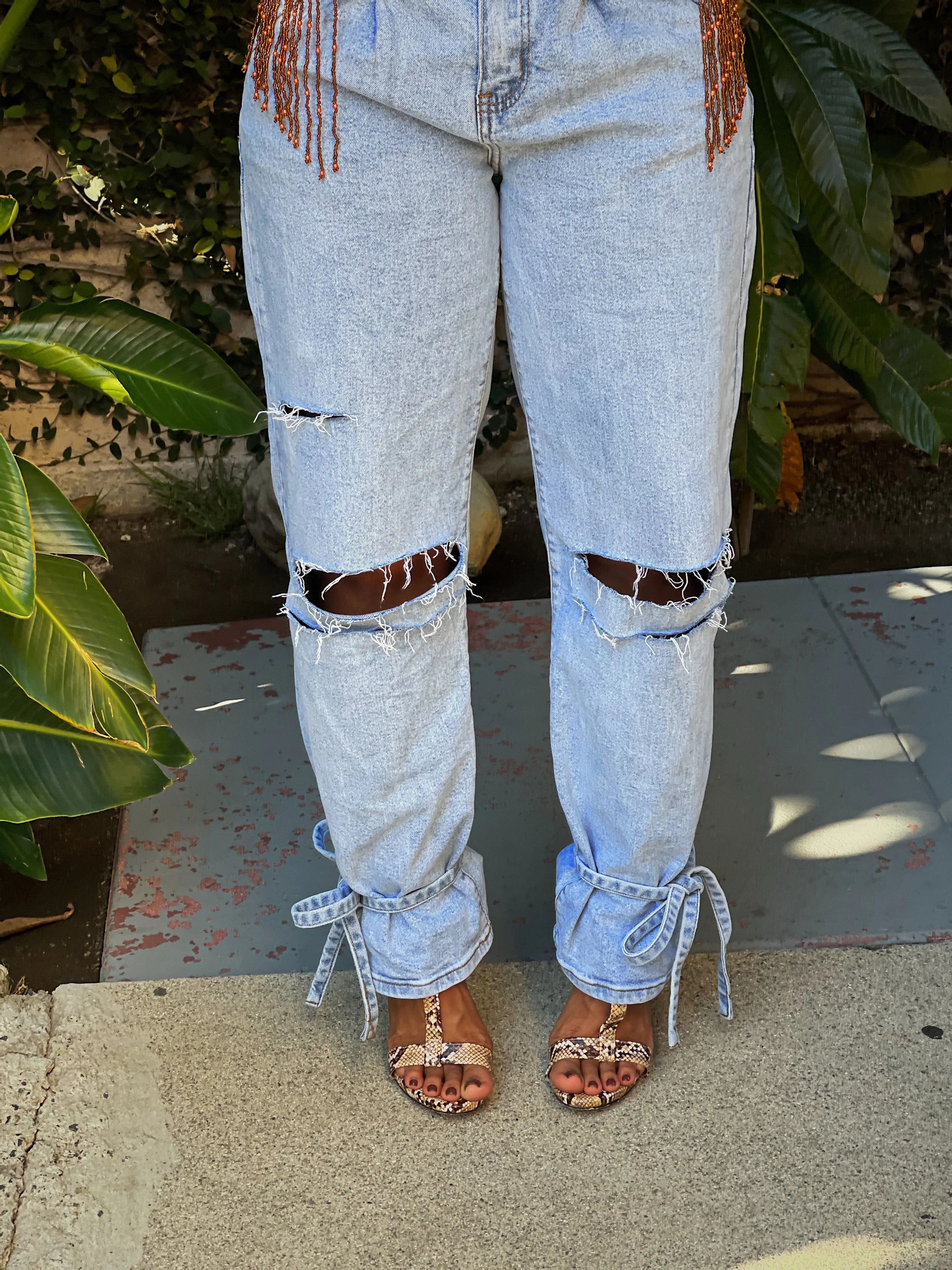 DISTRESSED, SLOUCHY MOM JEANS with ANKLE TIES